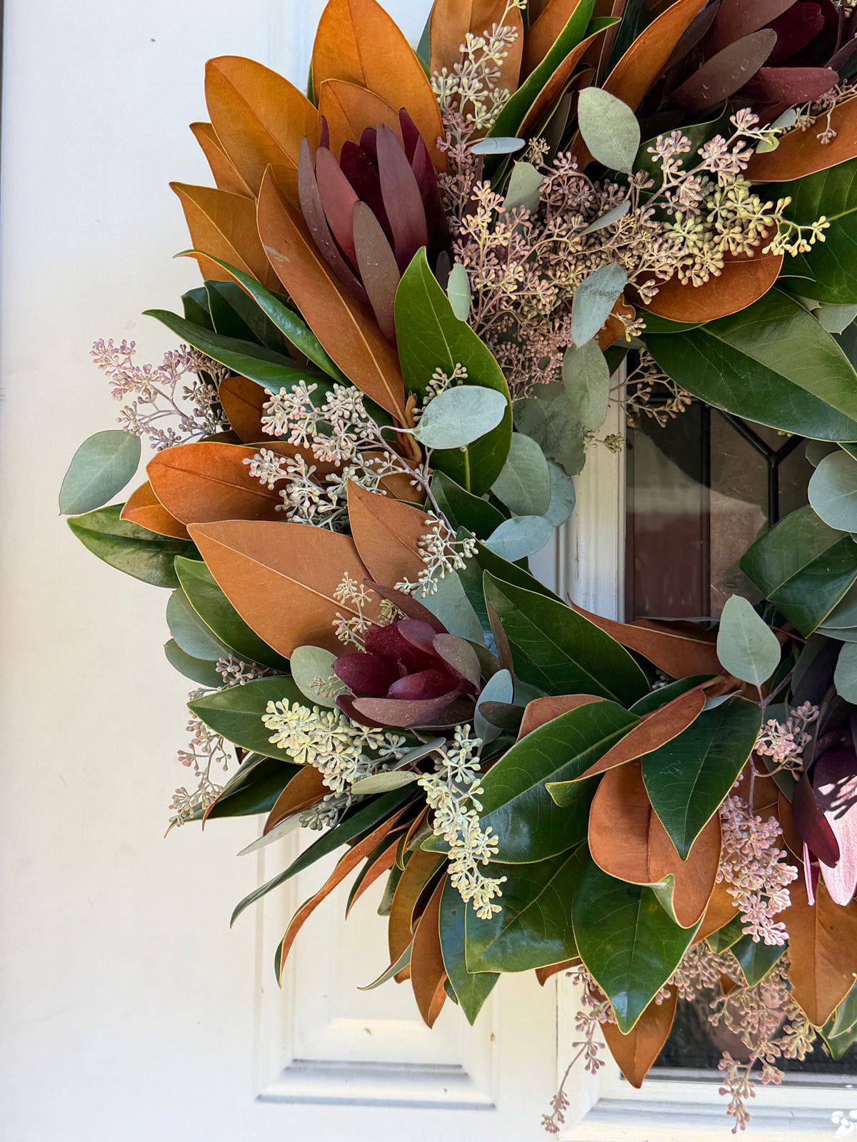 Fresh Safari Sunset Leucadendron, Seeded Eucalyptus, and Magnolia Wreath