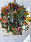Fresh Safari Sunset Leucadendron, Seeded Eucalyptus, and Magnolia Wreath