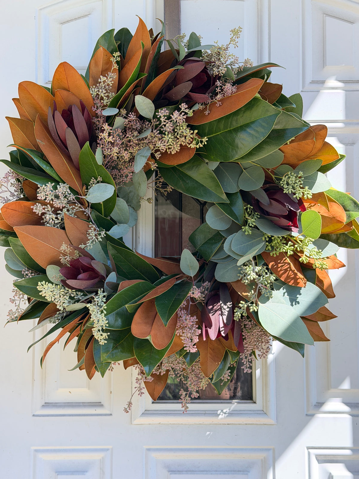 Fresh Safari Sunset Leucadendron, Seeded Eucalyptus, and Magnolia Wreath