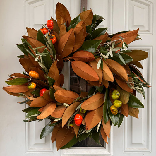 Fresh handmade magnolia olive and pumpkin tree wreath for fall autumn and Thanksgiving decor